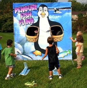 Penguin Fish Fling Stomp Launcher Game